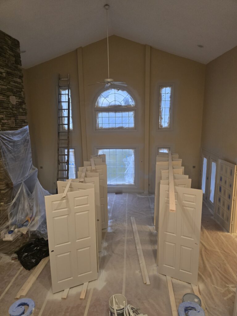 Baseboard Painting job in progress — Custom Painting of Asheville Inc